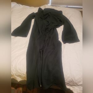 Green snuggie like blanket